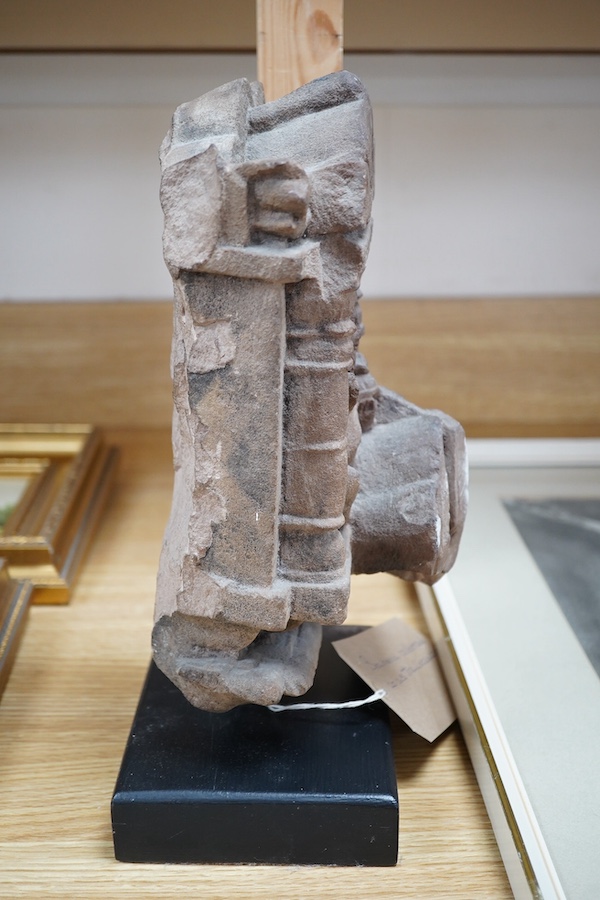 An Indian Hindu sandstone carving of Brahma the Creator, 14th century, 33cm high overall. Condition - commensurate with age